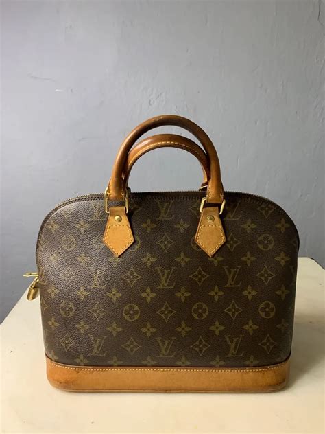 come capire se portafoglio louis vuitton è originale|portachiavi louis vuitton.